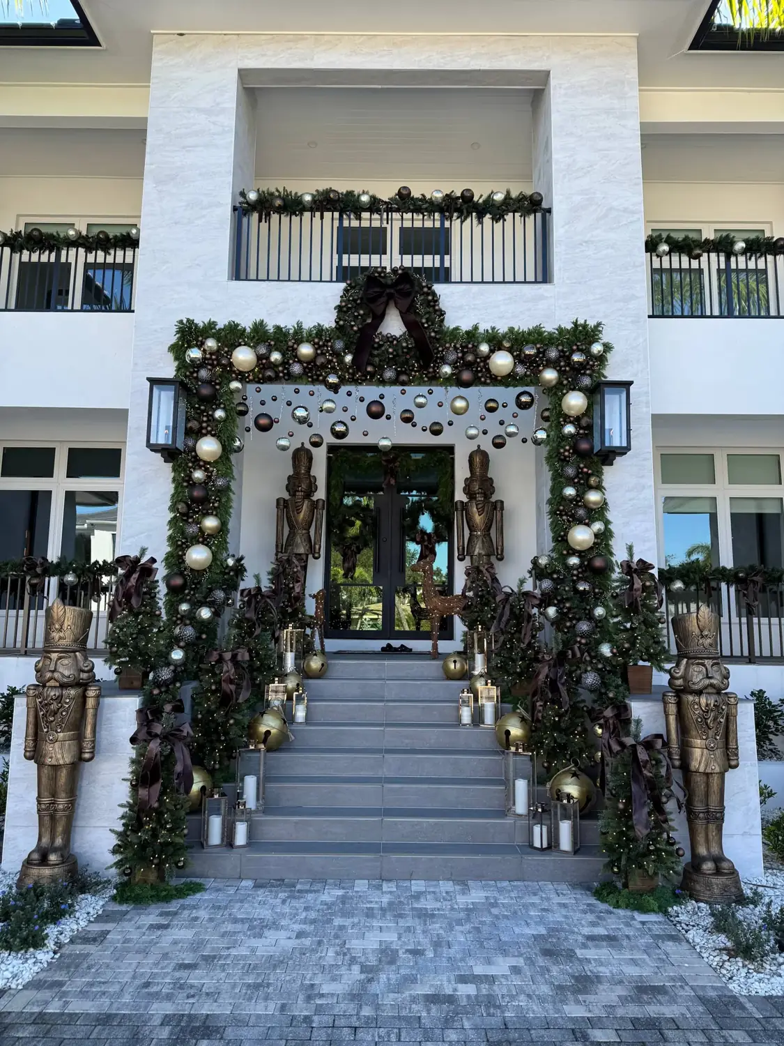 Grand entrance with garland, wreaths and lanterns on a Tampa home